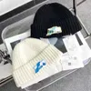 We11 outono e inverno selo de borracha de lã de malha de chapéu simples Estrela do mesmo estilo Sports Wool Hat Casal Hat Chapéu frio