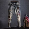 Mäns jeans avsmalnande grafiska jeans för män wi tryck Hip Hop Motorcykel Mens Cowboy Pants Boot Cut Summer High Quality Straight Xs Byxor J230814