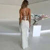 Casual jurken Solid Hollow Out Lace Up Damesjurk Mouwloze Backless Backless Wrapped Hip Beach Sexy Slim Fit Vacation Prom Party