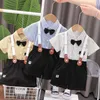 Set di abbigliamento Nuovi bambini Moda Estate Ragazzo Vestiti per ragazze Bambini Cotone T-shirt da uomo corta 2 pezzi / set Abbigliamento per bambini Tute per neonati