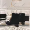 مصمم الخريف والشتاء الجلود أحذية كلاسيكية العلامة التجارية للسيدات الكاحل مع حذاء Zipper Boots Holiday Work Universal Black and White