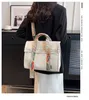 女性用のショルダーバッグキャンバスバッグ2023新しい日本と韓国のファッションハンドヘルドトートバッグ