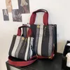 Bolsas de ombro bolsa de bolsa 2022 nova moda de lona listra bolsa de faixa larga de banda larga um ombro bagstylishhandbagsstore