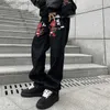 Pantaloni da uomo jeans stampati per i pantaloni da uomo hip-hop street per il diavolo maschile harajuku fumetti dritti pantaloni da strada denim z230815