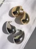 Stud Huanzhi Woda Drop Pół pustej kolczyki dla kobiet dziewczyna mosiężna gładka metal spersonalizowana prosta modna biżuteria 230814