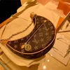 Top Luxury Designer Loop Bag Bags Bags Plouds Hobo Designer кошелек M81098 Косметическая полумесяца багет