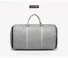 Sacs Duffel 2023 Fashion Grand Oxford Pliage Costume Bagure de rangement Femmes Fonction de voyage à main haut capacité Sport en plein air