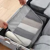 Duffel -Taschen 7pcs Gepäck Kleidung Aufbewahrungstaschen tragbare Unterwäsche Verpackung Würfel Reise -Unterpackung Kleidungs ​​Organizer Koffer Schuhsortierbeutel 230812