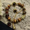 Braccialetti Charm Game Genshin Impact Bracciale Zhongli Morax unisex Cosplay Bell Bell Beads Braccialetti Accessori per gioielli Accessori per gioielli 230814