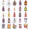 Accessoires de pièces de chaussures Single Vente 1pcs Tyres de type bière Beton rouge Bouteille de décoration Bouteille Clog Charmes pour bracelets Kids Gifts D Series au hasard