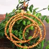 Strand Natural Peach Armband 216 Buddhist Pärlor 108 Rosary String Dongyang Wood Carving smycken Överföring Lycka till och fred