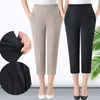 Spodnie damskie 2023 Kobiety wiosną lato Eleganckie kobiety swobodne solidne guziki Elastyczne wysoką talię harem pant Lady Pockets Spodnie i563