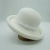 Chapéus de aba larga 202303-PAN-JUANBIAN VIDO ESTILO CUDDADO PURSO PURS Branco retrô de sol Curly Lady Sun Cap Women Leisure Hat Hat