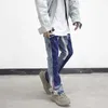 Vintage sıkıntılı sıçrama mürekkep parlaması kot pantolonlar erkek sokak kıyafeti patchwork hip hop grafiti ağır yıkama mavi ince fit denim pantolonlar hkd230812