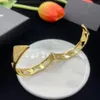 Neues Luxusdesigner -Schmuck 18K Gold plattiert - Edelstahlpaar Hochzeitsarmbänder Geschenkzubehör Großhandel- Großhandel-