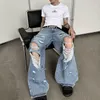 Jeans masculin 2023 Urban Street Unisexe Style lourdes conceptions de dégâts larges de jambe largement lavée Ripped