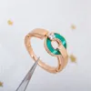 Diseñadora de marca Luxury Lady Jewelry Full of Diamond Fritillaria Peacock Peacock Green Hoop Lucky Pareja Anillos de monedas de cobre elegante