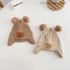 Caps Chapéus chapéu de bebê meninos sólidos e meninas desenho animado urso padrão inverno chapéu de malha de malha chapéu de urso quente infantil chapéu z230815