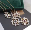 New designed Fashion Luxury full diamonds necklace four leaf lucky flower hollowed out earings studs Designer Jewelry Ear-999