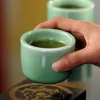 Tazze di piattini di lusso longquan celadon a mano che si riferisce alla tazza da tè tazza da tè tazza da tè