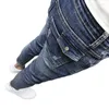 Herrbyxor grossist 2023 verktyg personlighet tvättade blå fötter jeans trendiga våren och sommarkoreanska sociala killen penna
