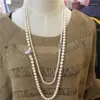 Łańcuchy Dwie kombinacje długie naturalne białe słodkowodne perłowe cyrkon czteropletekowe akcesoria motyli Naszyjnik łańcuch swetra