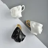 Mokken Nordic Decor Creative Face Shape Porselein Cup en Saucer Ceramics Simple Tea Sets Modern Design Coffee Cups 230815