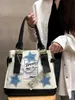 Schoudertassen Handgemaakte Y2K Millennium Spicy Girl Star Tote Bag American Campus English Canvas High Capaciteit textuur Caitlin_fashion_bags