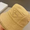 Designer Bucket Hats Luxury Triangle, Elegant Trendy Unisex Sunshade för fyra säsonger, bra material avslappnade sommarhattar, trevlig gåva