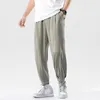 Herenbroek zweetwedstrijden vrachtmannen met elastische taille pyjama's flodderige harem kleding sporten joggers pantalones