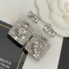 Orecchini per borchie di designer Orecchini di alta qualità Donne Lettera di marca Materiale di rame Crystal Pearl Earring Drop Drop 18K Giorni placcati in oro Gift