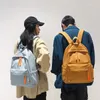 Rugzak kuzai nylon vrouwen vrouwelijke twill kawaii reistas unisex solide color schoolbag tiener preppy stijl kleine boektas