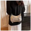 Schoudertassen Spicy Girl Motorcycle Bag Fashion onderarm tas 2023 Nieuwe geavanceerde damestas mode coole kettingtas een schouder crossbody tas caitlin_fashion_bags