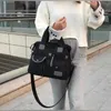 Schoudertassen damestas 2023 NIEUWE mode veelzijdige crossbody mama tas grote capaciteit gesplitste buitenreistas caitlin_fashion_bags