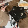 Torby na ramię Millennium pikantne dziewczęta „torba dziewcząt” Tekstura Y2K plecak Summer Modna pięciopunktowa łańcuch gwiazd mały plecak Caitlin_fashion_bags