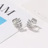 أزياء أقراط الأزياء Zirconia style leaf leaf دعم المجوهرات للسيدات.