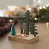 キャンドルホルダー1PCクリスマスキャンドルスティックかわいい木製サンタクロースハウスエルクシェイプホルダークリスマスイヤーパーティーディナーテーブル装飾