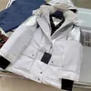 Women giacca designer Women Down Coat Top Inverno Coats Cololorblocking con cappuccio con cappuccio grande tasche a cintura intrecciata con fibbia intrecciata designer di design di design a vento