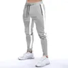 Calça masculina muscle fitness sortpants primavera esportes esportes atropeleiro treinar lápis de cor sólida