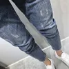 Herrbyxor grossist 2023 verktyg personlighet tvättade blå fötter jeans trendiga våren och sommarkoreanska sociala killen penna