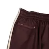 Pantaloni da uomo Casuals di alta qualità Aghi di alta qualità uomini da donna Donne Dispositiva di pantaloni a strisce a strisce ricami farfalla classici marrone 230815