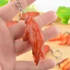 Keychains Creative Simulation Food Keychain PVC Model Soft Lim Fake Braised Pork Belly Rostad kycklingvinge Key Chain Bag Pendant Jewelry