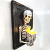 Nowość 1PC Nowy Halloween Skull Photo Photo Frame Candle Materiał żywiczny Materiał szkieletowy horror atmosfera dekoracyjna ozdoba żywiczna J230815