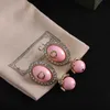 Diseñador de encanto nuevo verano estilo royal style rosa precisión artesanía con incrustaciones con material de latón de diamante de diamantes Pendientes de moda para mujeres