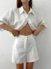 Trass de pista feminina de duas peças do conjunto de mulheres vestido de linho branco fino 2023 Moda camisa de manga curta com shorts de cintura alta feminina casual feminina