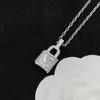 Goud Luxe Designer Lock Ketting Designer Dames Roestvrij Staal Pandant Meerkleurig Vergulde Bruiloft Sieraden CHD23081531-6 flybirdlu