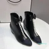 Stivali da donna Stivali in pelle in pelle in bianco e nero Tasselboot a catena perla