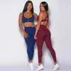 Kvinnors tvåbitar byxor Sexig Cross Backless Hollow Gym Leggings Set Women Sportwear Training Suit for Fitness Yoga Wear Female Sport Outfit