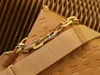 Explosion Frauen heiße Handtaschen Taschen Baguette Coussin PM M21261 Mode Lambskin Chunky Gold Farbkette Helle lebendige Freude Frauen unter Kamel Reißverschluss Kalbskin Good Leder