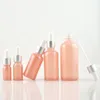 5 10 15 20 30 50 ml di gocce di gocce di olio essenziale in vetro rosa bottiglie rotonde vuote con distributore di gocce di vetro per oli essenziali PE SDVU